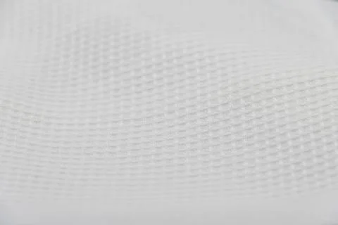 Macro shot texture pattern of folded white towel kitchen fabric Stock-Fotos