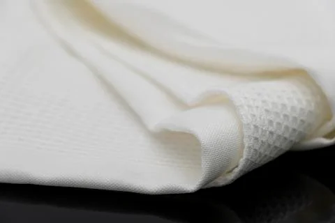 Macro shot texture pattern of folded white towel kitchen fabric 스톡 사진