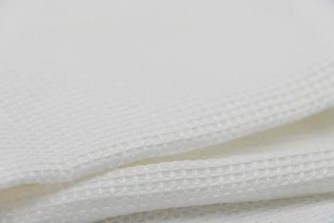 Macro shot texture pattern of folded white towel kitchen fabric 스톡 사진