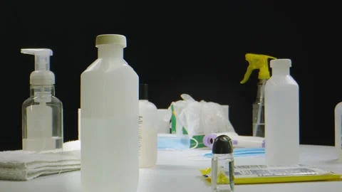 Macro shot of thermometer, gloves, mask and sanitizers Stock Footage 130413570
