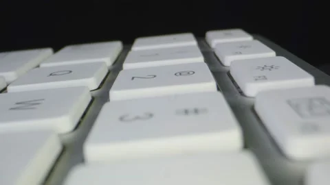 Macro shot through computer keyboard Stock Footage 130596257