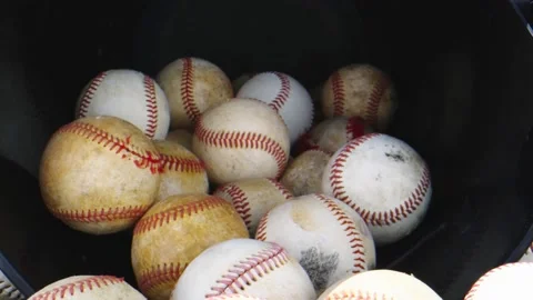 Macro shot through group of baseball balls Stock Footage 131690497