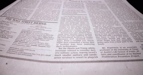 Macro shot through a newspaper Stock Footage 179533577
