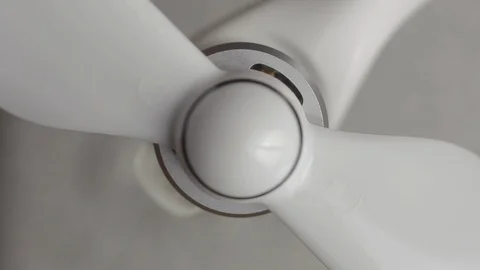 Macro shot top down brushless motor. Preparing a drone before flight, removing 스톡 동영상 128631588