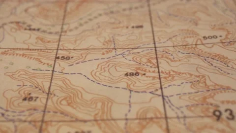 Macro shot of topographic map displaying contour lines, shallow focus Stock Footage 163538283