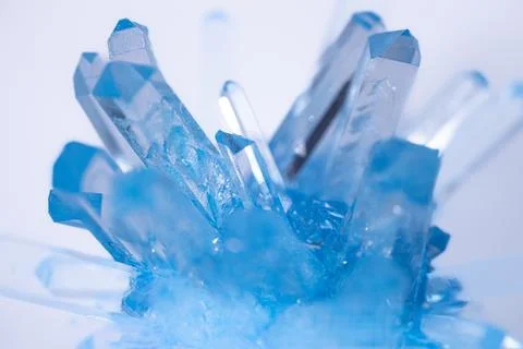 Macro shot of translucent blue crystal dots with clean. Stock Photos