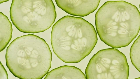 Macro Shot of Transparent Slice of Cucumber Fruit and Rotate. Closeup Fresh Stock Footage 154614922