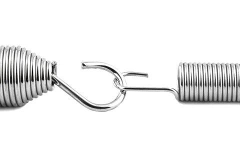 Macro shot of two new linked springs, isolated on a white background. Stock Photos
