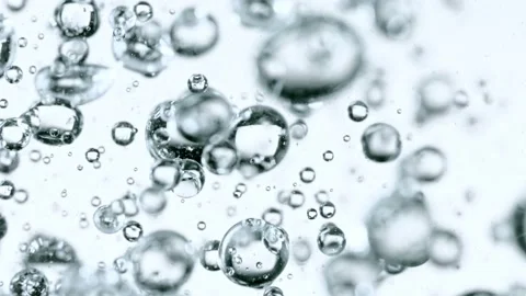 Macro shot of various air bubbles in water rising in slow motion Vídeo Stock 147866979