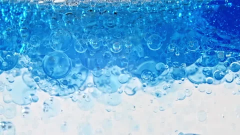 Macro Shot of Various Air Bubbles in Water Rising up on Light White Background Video stock 160459281