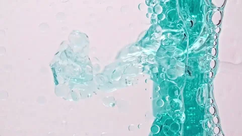 Macro Shot of Various Air Bubbles in Water Rising up on Light White Background Stock Footage 161872157