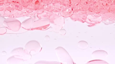 Macro Shot of Various Air Bubbles in Water Rising up on Light White Background Video stock 195288457