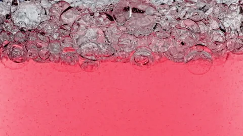 Macro Shot of Various Air Bubbles in Water Rising up on Light White Background Stock Footage 221838465