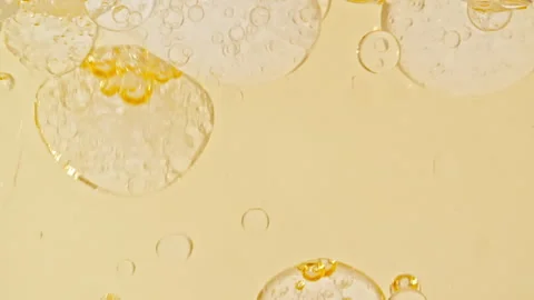 Macro Shot of Various Air Bubbles in Water Rising up on Light White Background Stock Footage 263726279