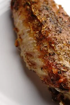 A macro shot of a vertical one-wing turkey baked in the oven Stock Photos