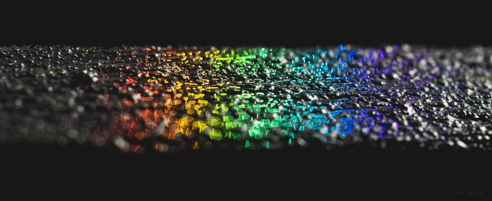 Macro shot of a vibrant array of colors, created by the refraction of light thro Stock-Fotos