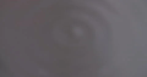 Macro shot of vibrating water Video stock 136485372