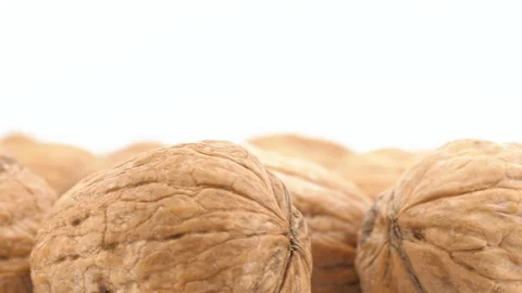 Macro shot of walnuts isolated rotating on white background Stock Footage 85959368