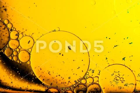 Macro shot of water oil emulsion over colored background Stock Illustration