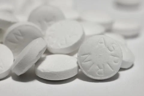 Macro shot of white aspirin pill Stock Photos