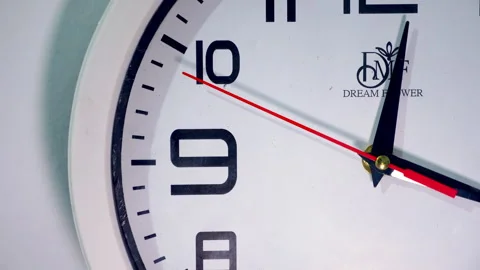 Macro Shot of White Clock Face Top-Left Quarter Moving 9 to 12 Stock Footage 337191790