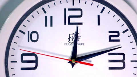 Macro Shot of White Clock Top Half with Red Second Hand Moving 9 to 3 Stock Footage 337398360
