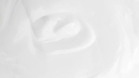 Macro Shot of White Cream Texture Rotating Top Down Stock Footage 317316920