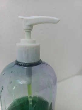 Macro Shot of White Plastic Pump Dispenser on Liquid Soap Bottle Stock Photos