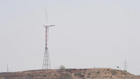 Macro shot of wind energy tower situated on hill Stock-Footage 151911425