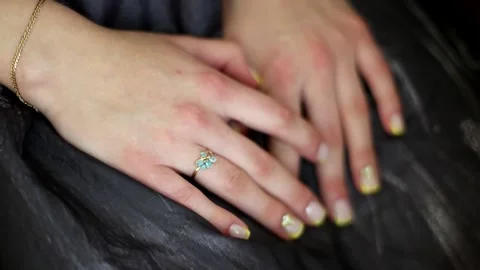 Macro shot of a woman's hand in a black dress. Media. Close-up of female palms Stock-Footage 145084677