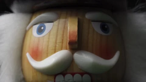 Macro Shot Of Wooden Christmas Nutcracker, Face Of A Festive Toy Soldier Stock Footage 145375273
