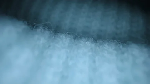 Macro shot of woolen fabric texture, knitted wool pullover slider close-up Stock Footage 233524530