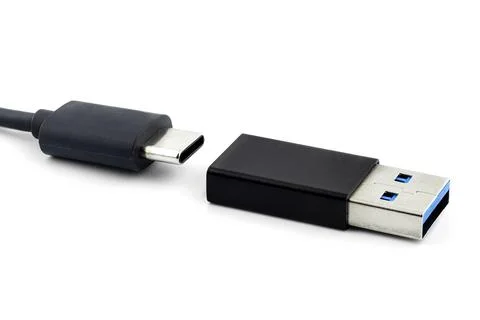 Macro shots of the USB 3.1 Type-C cable and adapter to USB 3.0 type A, isolat Stock Photos