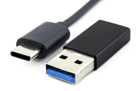 Macro shots of the USB 3.1 Type-C cable and adapter to USB 3.0 type A, isolat Stock Photos