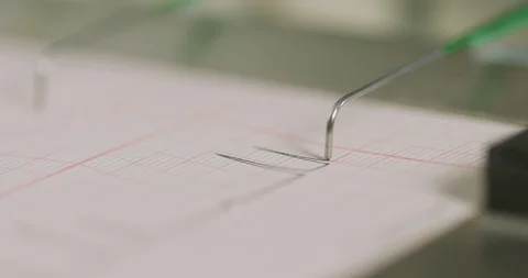 Macro showing the lines from a lie detector machine Stock Footage 116559902