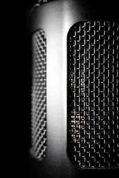 Macro Side View of Isolated Large Diaphragm Condenser Microphone Grill Stock Photos