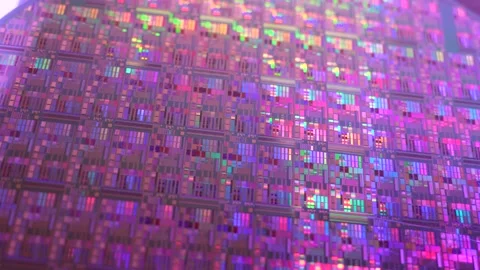 Macro of silicon wafer semiconductor with neon color, integrated circuits Stock Footage 171721990