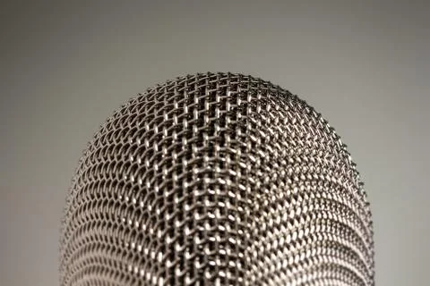 Macro Silver Microphone on White Background 库存照片