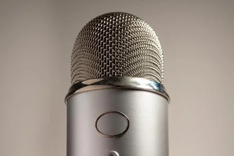 Macro Silver Microphone on White Background 库存照片
