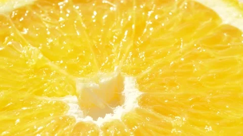 Macro slice of citrus orange fruit texture, close-up healthy food background Stock Footage 143058799