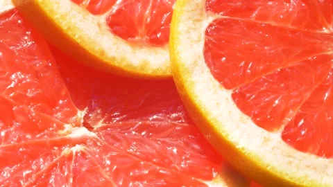 Macro slice of citrus orange graipfruit texture, closeup healthy food background Stock Footage 141636266