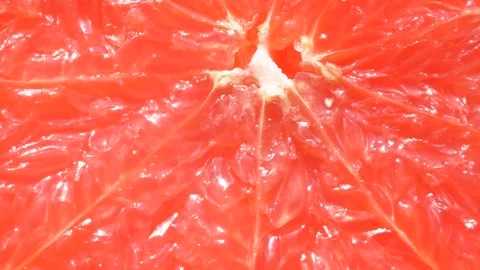 Macro slice of citrus orange graipfruit texture, closeup healthy food background 스톡 동영상 143580271