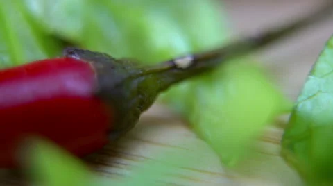 Macro Sliced Chili Lettuce on Cutting Board 60 fps Stock Footage 59852183