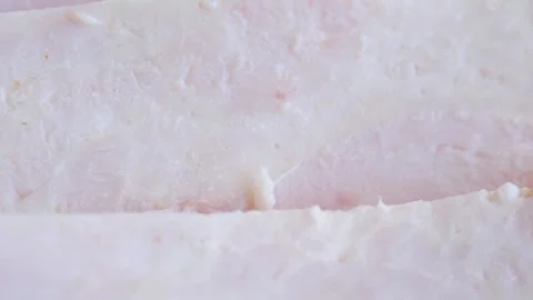 Macro sliced smoked ham texture food Stock Footage 337893088
