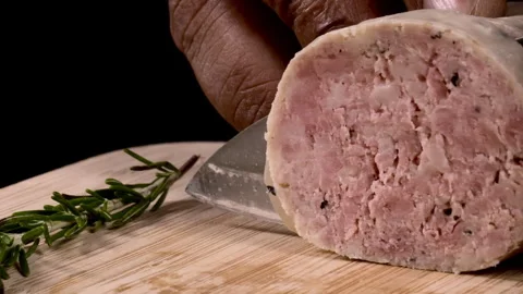 Macro Slicing of a Garlic Sausage Stock Footage 248745107