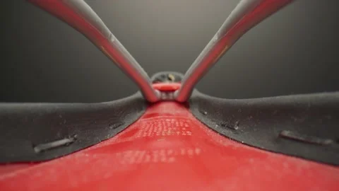 Macro Slider Shot of Bicycle Saddle (Underside) | Laowa Probe Lens | 4K Stock Footage 231660615