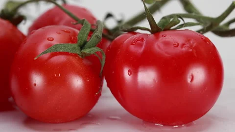 A Macro Slider Shot Moves From Left To Right, Revealing Ripe Red Cherry Tomatoes Stock Footage 322585351