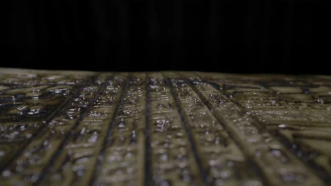 Macro slider view of ancient text on a clay tablet in Egyptian mythology Stock Footage 140674528