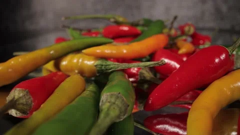 Macro sliding shot over Rawit Chili peppers in close-up Stock Footage 149801475
