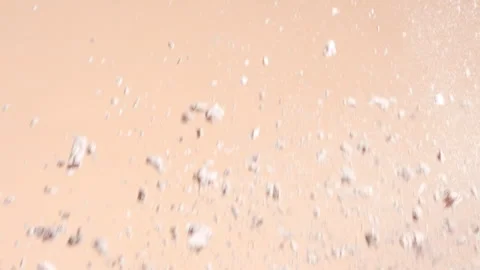 Macro slow motion of beige powders colliding Stock Footage 339387169